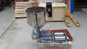 Machine de remplissage pneumatique automatique double tête de haute qualité pour liquides (lait, jus, boissons, produits chimiques) avec pompe à bouteilles intégrée - Product Image 5