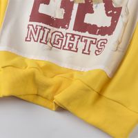 Sweat-shirt à capuche décontracté jaune de luxe SAINT avec empiècements, vêtements pour hommes de haute qualité, streetwear tendance pour hommes
