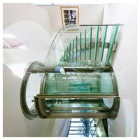 Escalier courbé intérieur à forte charge, style circulaire moderne, marches en bois de chêne pour villa, bureau, projet de construction commercial