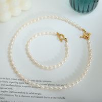 Ensemble de bijoux personnalisé en perles d'eau douce, collier et bracelet, fermoir OT en acier inoxydable, pour femmes