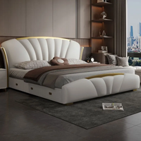 Lit en bois moderne de luxe minimaliste italien sur mesure, taille Queen/King, avec tête de lit à éclairage LED, station de charge et rangement à 2 niveaux, rembourré