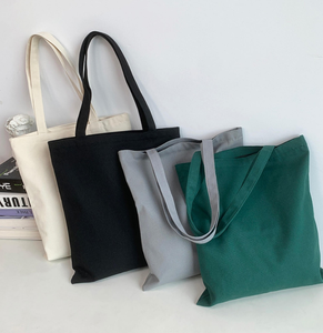 Sac en toile blanc en coton pur avec logo personnalisé, idéal pour la marquage à chaud et les sacs shopping en toile personnalisés. - Product Image 1