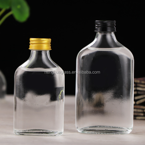 Échantillon gratuit bouteille de boisson en verre transparent 50ml <span class=keywords><strong>100ml</strong></span> 200ml 250ml 350ml bouteille de whisky liqueur en verre plat avec bouchon à vis - Product Image 1