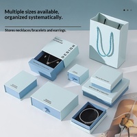 En stock : Coffret à bijoux Série Bleue avec intérieur en éponge texturée, emballage cadeau pour collier, bracelet, boucles d'oreilles