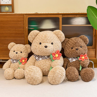 Vente en gros de jouets professionnels d'usine Ours en peluche 50cm 65cm 80cm 100cm Ours en peluche avec écharpe tenant des fleurs en peluche pour GI