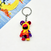 Porte-clés en PVC créatif et coloré en forme d'ours graffiti, pendentif pour sac à dos, ornement en plastique, cadeau pour enfants, vente en gros