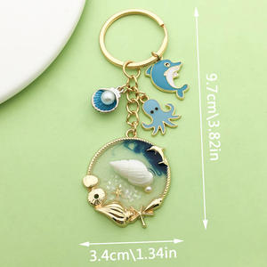 พวงกุญแจโลหะรูปเปลือกหอยการ์ตูน ประดับมุก ปลาดาว ปลาโลมา ปลาหมึก  งานเคลือบเงา  สำหรับทำเครื่องประดับ DIY  กระเป๋าชายหาด - Product Image 3