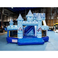 Château Elsa bleu commercial avec toboggan pour fêtes d'enfants, robuste et durable