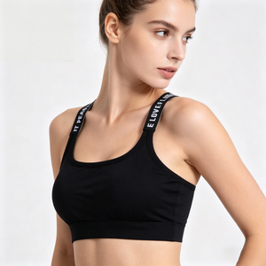 Ropa interior deportiva para mujer, top corto sin costuras para yoga y fitness, con tirantes anchos con letras, cómodo para entrenamiento, sin aros. - Product Image 1