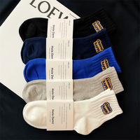 Chaussettes de cyclisme en tissu éponge personnalisées en gros avec logo, chaussettes de basket-ball brodées, chaussettes de sport athlétiques personnalisées avec logo
