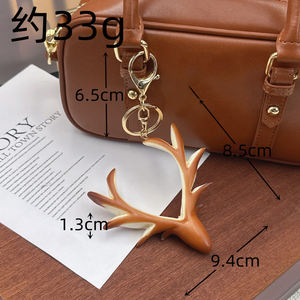 Breloque de sac et porte-clés en PVC, mignonne, légère, en forme de pain, de bretzel ou de croissant, avec nœud, accessoire de bijouterie pour sac à dos - Product Image 6