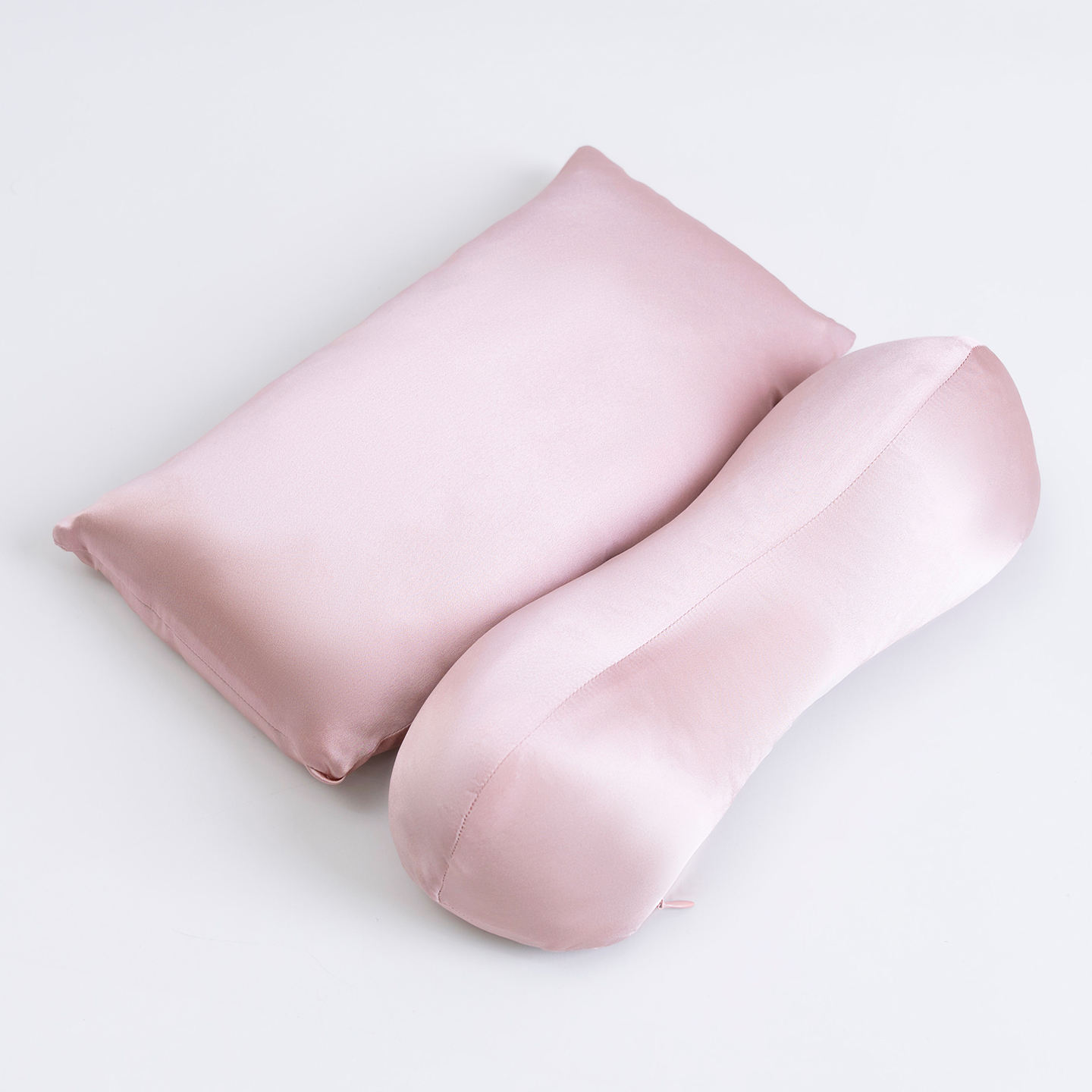 หมอนผ้าไหมสีชมพูสำหรับยืดกระดูกคอ