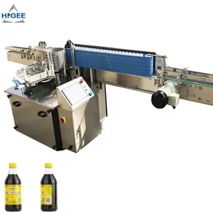 Hot sauce glass bottle cold glue labeling machine with chili glass jar automatic wet glue labeling machine paste labeller