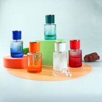 Vaporisateur de parfum de 30ml 50ml 100ml Flacon de parfum vide en verre de forme ronde transparent avec bouchons multicolores
