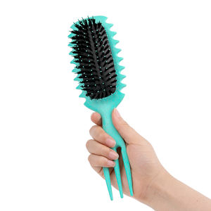 Pinceau à boucles définissantes avec broches pour réduire la séparation des cheveux bleus et définir les cheveux bouclés. - Product Image 4