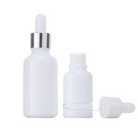 Vente en gros 5ml 10ml 15ml 20ml 30ml 50ml 100ml Essence liquide blanc laiteux Bouteilles de lotion d'huile d'essence et contenants en verre cosmétiques