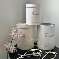 Boîtes à fleurs roses romantiques de luxe en forme ronde pour les faveurs de mariage et les emballages cadeaux