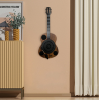 Rock Your Music : tourne-disque vinyle en forme de guitare pour une expérience classique