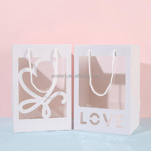 Bolsas de Papel Kraft de Lujo con Logotipo Personalizado, Materiales Reciclados y Asa de Listón para Uso Promocional - Product Image 1