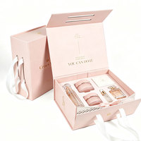 Scatola regalo magnetica pieghevole a basso costo OEM ODM, scatola rigida personalizzata con stampa e maniglia in nastro di raso per produttori di abbigliamento e cosmetici