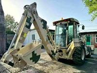 Escavatore Caricatore XT870 Versatile Usato, Velocità di Traslazione 40km/h, Lunghezza 7173mm per Lavori Agricoli, Paesaggistici e di Scavo