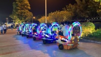 Train de parc d'attractions sans rails avec sièges oscillants et fonctions de tir pour centres commerciaux, utilisation en extérieur et en intérieur, 10-20 passagers
