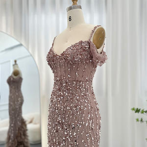 ชารอนกล่าวว่า ชุดราตรีสีชมพูประดับเลื่อมขนนก สายเดี่ยวแบบสปาเก็ตตี้ ยาวกรอมพื้น รุ่น SS169 สไตล์โมเดิร์นหรูหรา เหมาะสำหรับงานแต่งงาน งานเลี้ยง งานพรอม และงานพิธีต่างๆ - Product Image 3