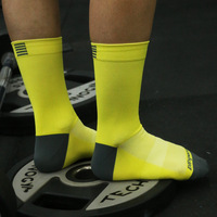YOUME Chaussettes de sport professionnelles de haute qualité Chaussettes de vélo de route respirantes Unisexe Sports de plein air Chaussettes de cyclisme de course