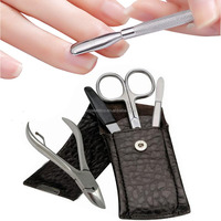 Ensemble de manucure allemand en acier inoxydable avec pochette marron à motif crocodile attrayant
