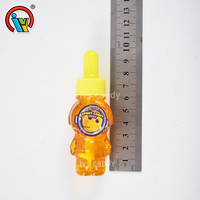 Saveur de fruits en forme d'astronaute bouteille compte-gouttes liquide confiture bonbons approvisionnement en usine