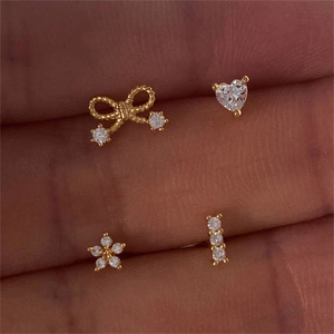 CANNER Juego de 4 Piezas de Aretes Pequeños de Plata de Ley 925 con Forma de Corazón, Lazo Simple, Flor Geométrica y Circonita para Mujeres y Niñas - Product Image 4