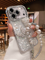 Coque de téléphone de luxe rose en forme de coquille avec papillon 3D et perles, et bracelet chaîne de main en strass scintillant pour iPhone 18 17 Pro Max 16 15 14 13 11