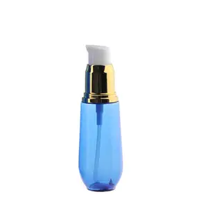جودة عالية زجاجة بلاستيك زرقاء لمنتجات التجميل والكريمات زجاجة لوشن فاخرة بمضخة موزع ذهبية