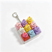Porte-clés de clavier Halloween avec bouton de simulation de dumpling à visage souriant, jouet sensoriel à presser en forme de dumpling à neuf compartiments, pour sac à dos