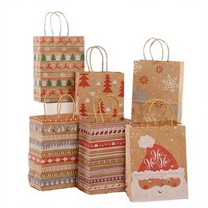 Sacs cadeaux jetables en papier kraft imprimés, motif Père Noël, flocon de neige, pois, dessin animé, rayures, sapin de Noël, bonbons, biscuits - Product Image 4