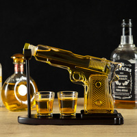 Venta al por mayor pistola personalizada whisky decantar vidrio conjunto jarra botella de licor contenedor dispensador decantador de whisky con vaso de chupito