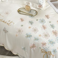 Ensemble de literie en soie véritable de style princesse d'usine ensemble de quatre pièces de drap de lit d'été brodé en soie glacée double face pour un usage domestique