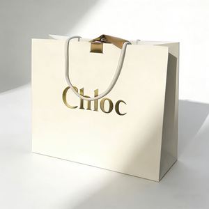 Custom Retail Kraft Paper Shopping Clothing Shopping <b>Gift</b> <b>Bag</b> <b>Luxury</b> Handle Mini Packaging Printed Paper <b>Bag</b> With Logos - Product Image 3