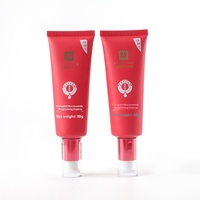 Flacon cosmétique vide en plastique souple rouge de 80g pour crème pour les yeux avec tête de pompe à vide à pression de 40 mm de diamètre
