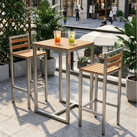 Table haute d'extérieur en composite bois et métal avec chaises – Mobilier commercial moderne pour café, restaurant, bar et terrasse