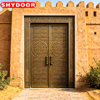 Porte d'entrée principale de villa de luxe, style mosquée arabe, en cuivre antique sculpté, double porte de sécurité islamique