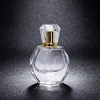 Flacon de parfum transparent de 30 ml en verre rond avec bouchon doré, emballage personnalisé, vente chaude, directement de l'usine