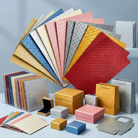 Papier gaufré en lin 120-350 g/m² Carton texturé spécial pour emballage de boîtes cadeaux de luxe et sacs de shopping haut de gamme