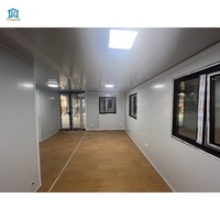 Maison préfabriquée de luxe à 2 chambres avec module mobile extensible en conteneur d'acier de 40 pieds pour utilisation hôtelière dans les petites maisons flottantes