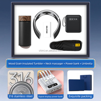 Coffret cadeau de vacances promotionnel cadeau personnalisé unique flacon sous vide de Noël + masseur de cou + batterie externe + impression de logo de parapluie