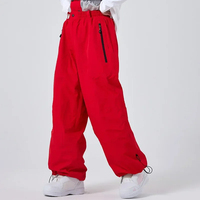 2025 nouveaux hommes femmes Sports de plein air ski pantalon coupe-vent imperméable hiver Ski snowboard pantalon chaud lâche neige sac