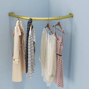 Porte-vêtements mural en métal courbé en L sur mesure pour boutique de vêtements - Product Image 1