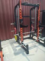 Vente en gros à chaud en usine tout-en-un Peigne commercial Trainer Home Fitness Equipment Power Multi Functional Squat Rack Smith Machine