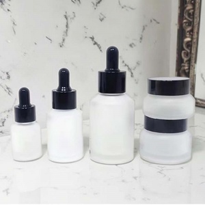 Slant Shoulder Brown Transparent Glass Cosmetic <b>Bottles</b> Clear Frosted with Plastic Cap 1 Oz Serum <b>Dropper</b> for Essential Oil - Product Image 1