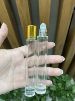 Botol bening parfum minyak esensial kaca kosong silinder persegi 10ml botol Rollerball pengeluaran kosmetik dengan tutup sekrup